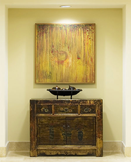 Abstract gold drip painting on wood, in situ